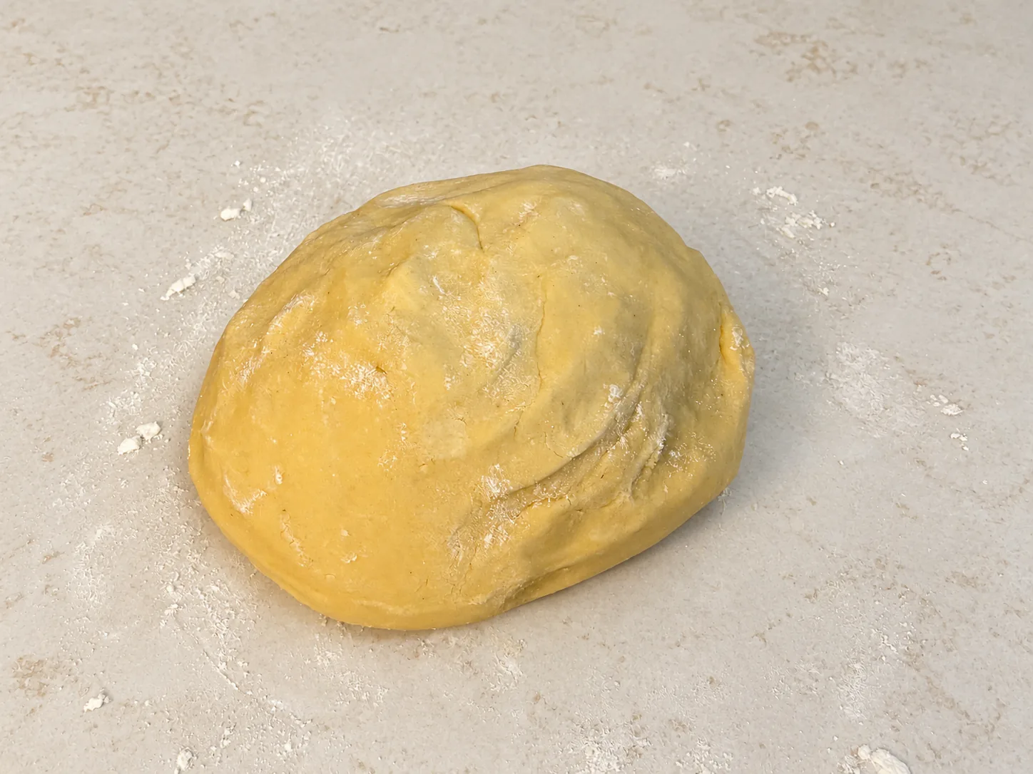 The mixed dough gathered into one ball