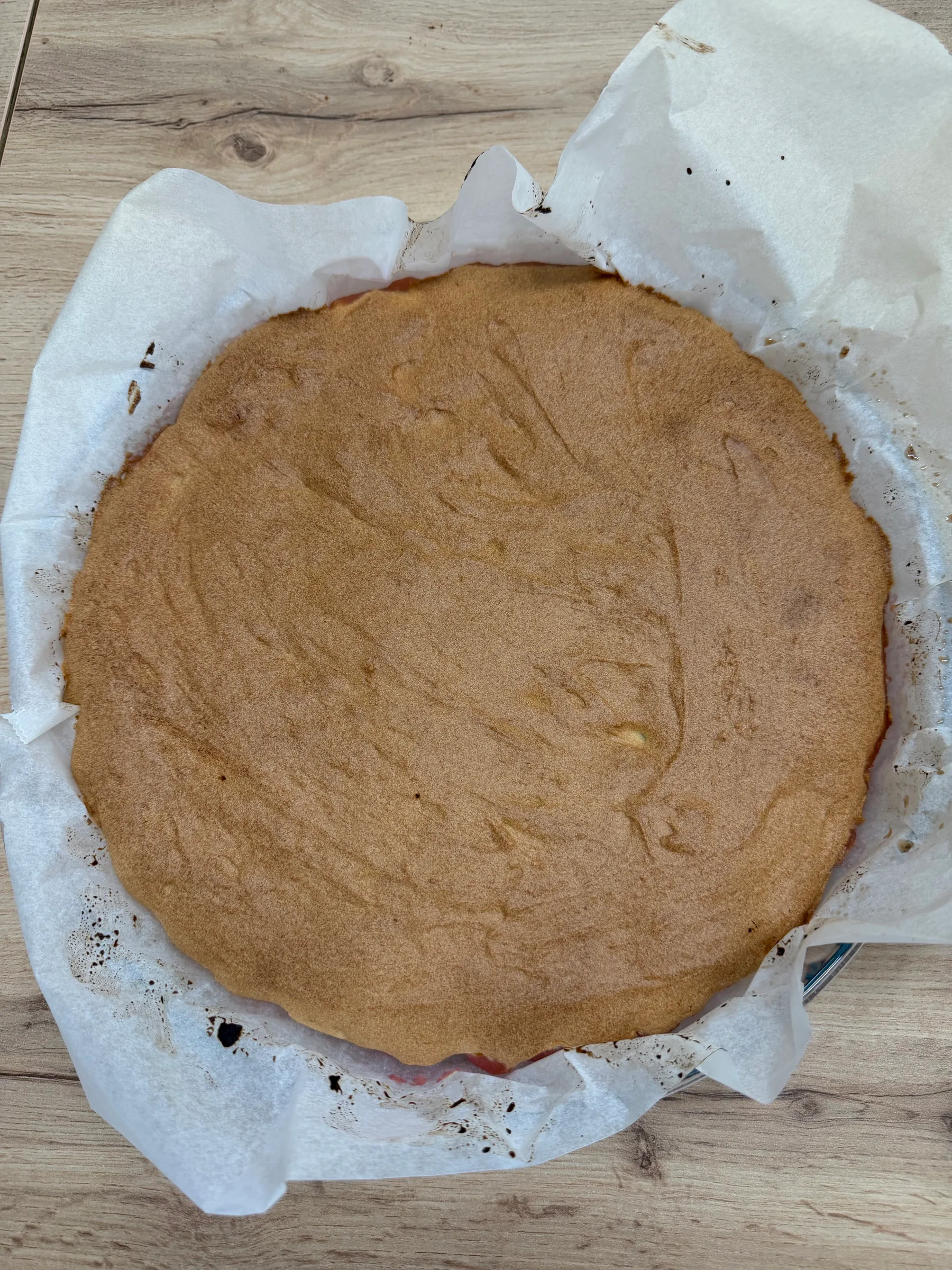 Golden cake in its pan before inverting