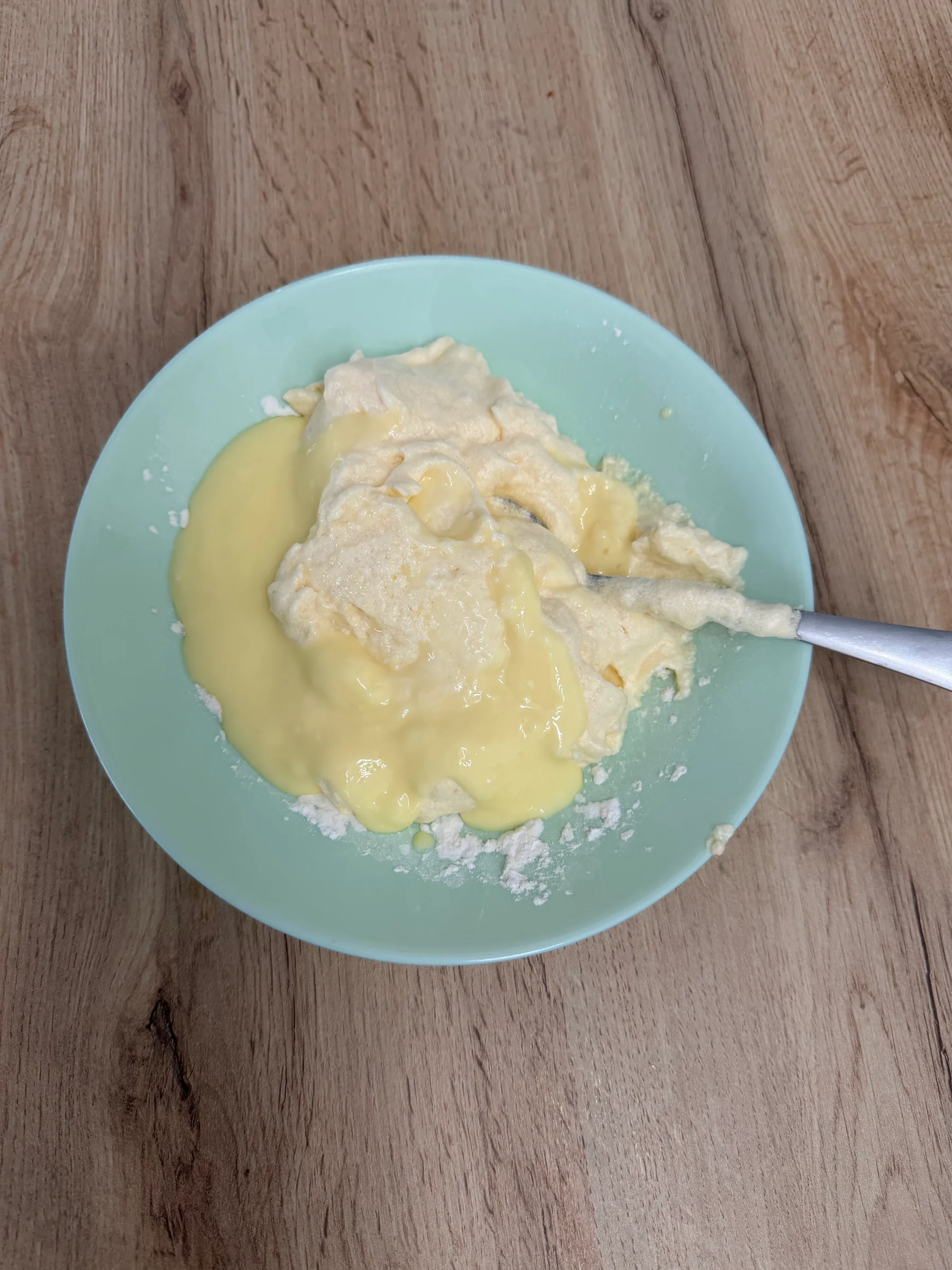A small portion of batter mixed with melted butter