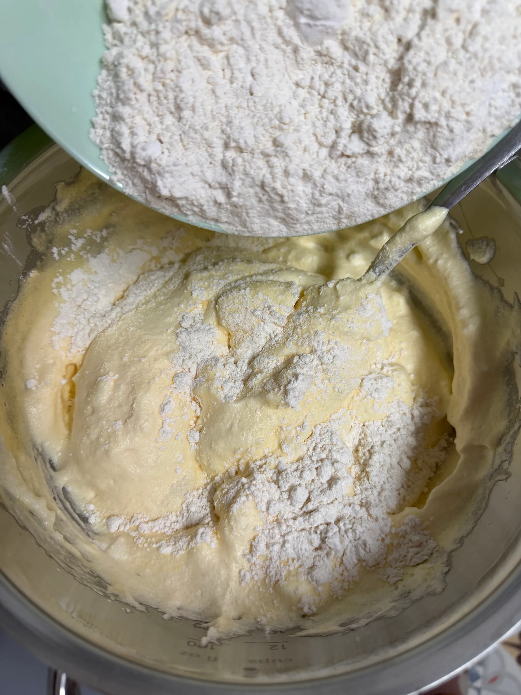 Dry ingredients being added to the egg mixture