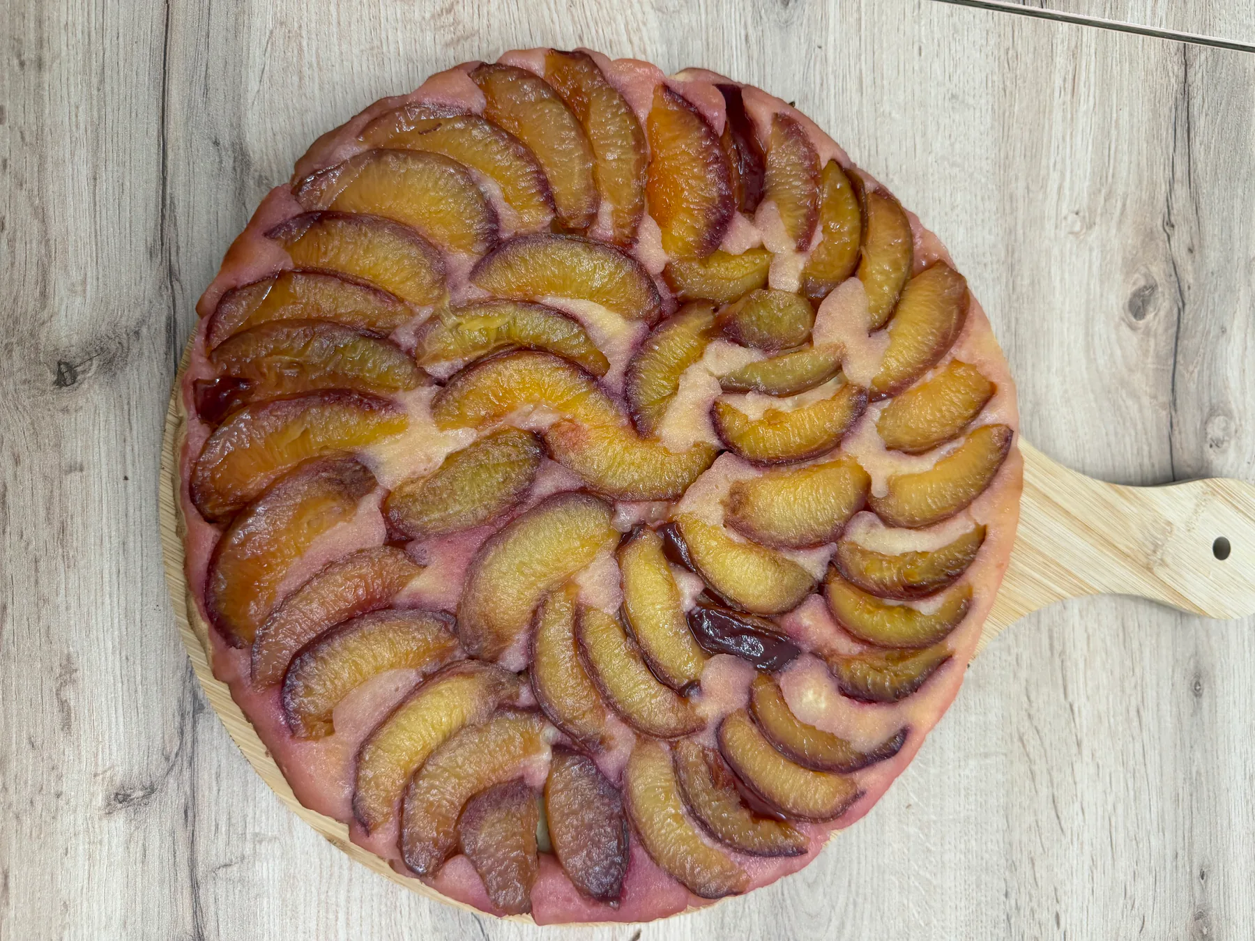 Finished upside-down plum cake